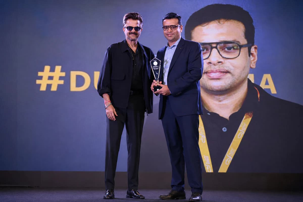 Award ceremony moment featuring Dr Satyarth Prakash